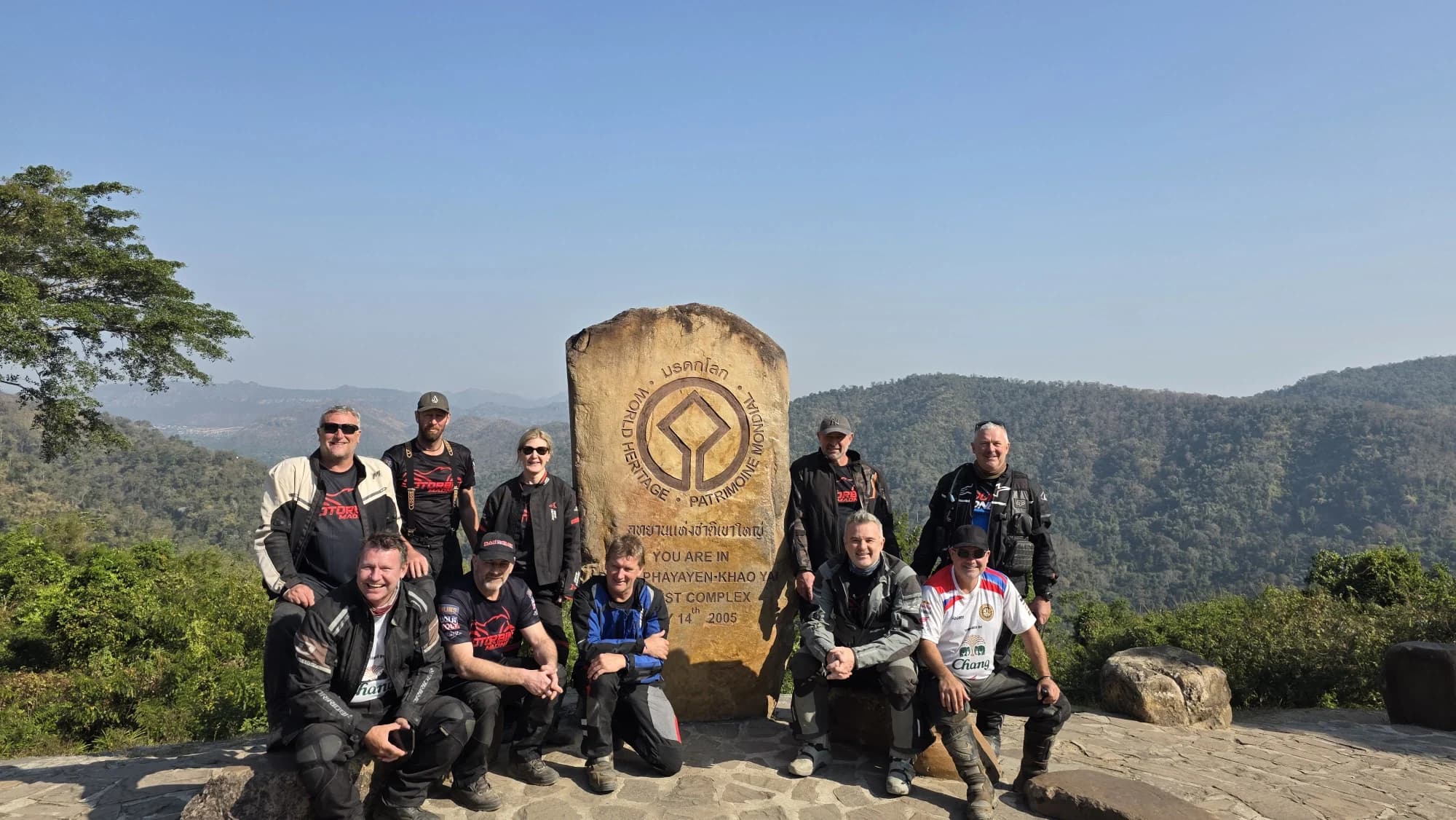 Riders group photo on a mountain