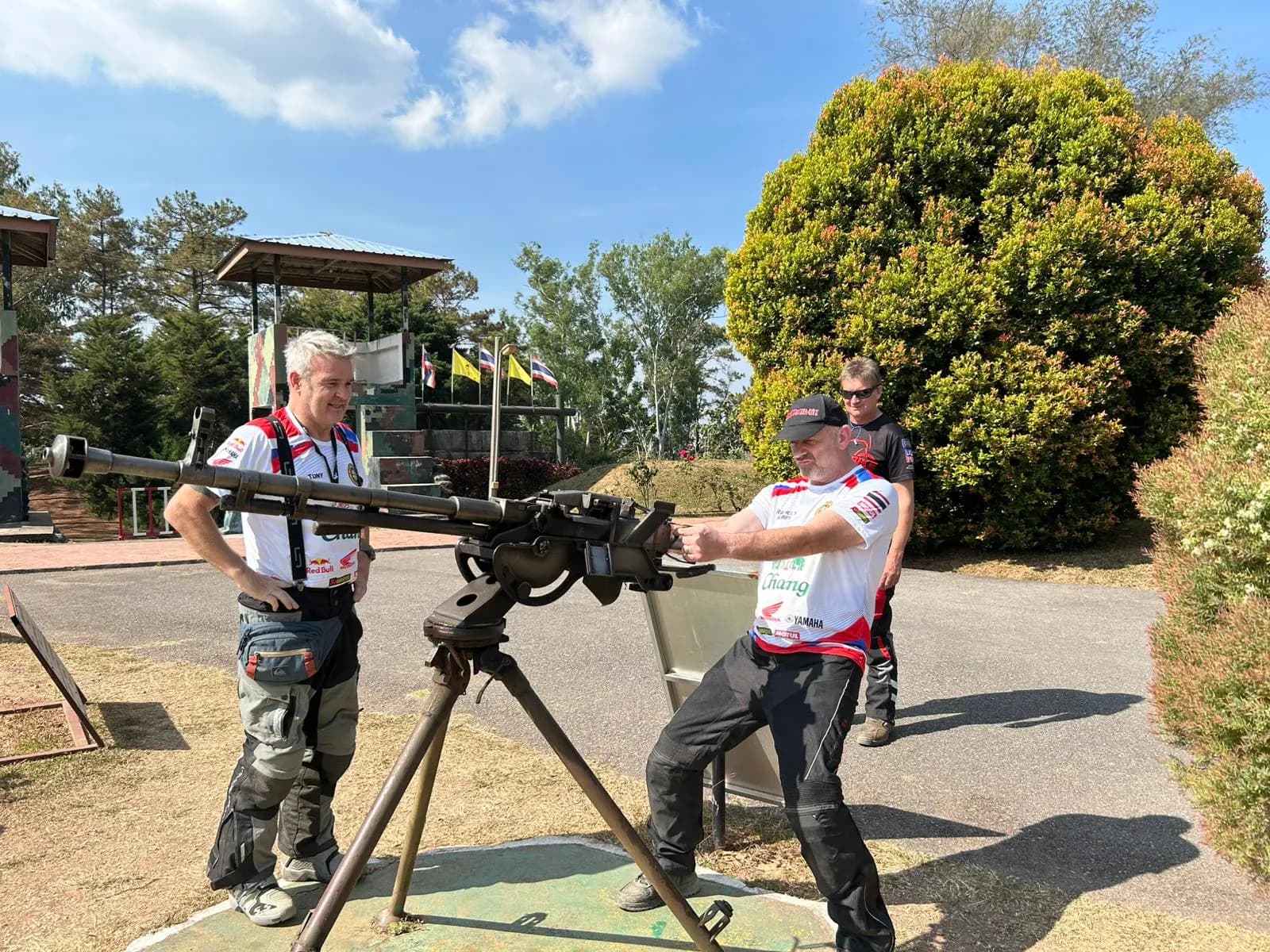 Rider posing with a historic gun