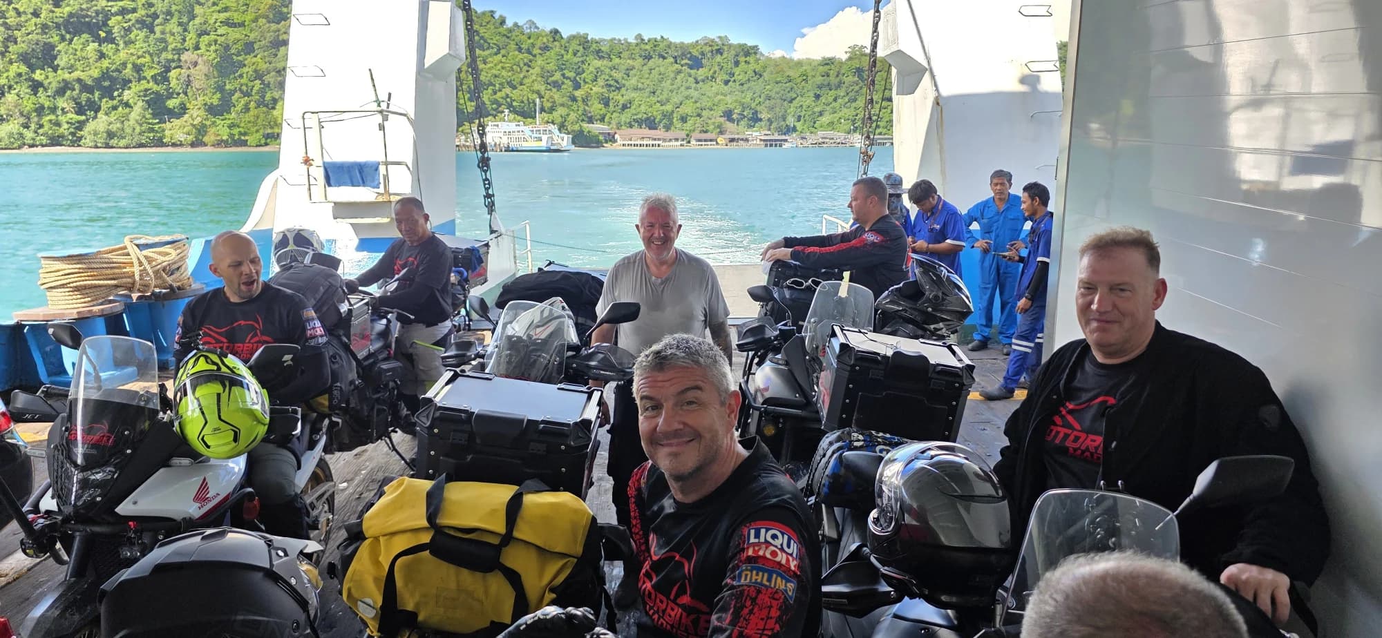 Riders with motorcycles on a ferry