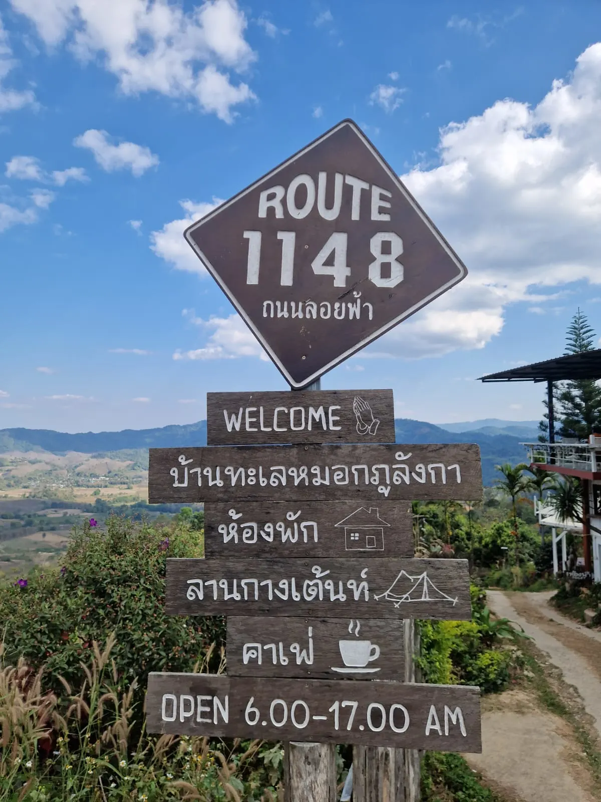 A sign on a mountain