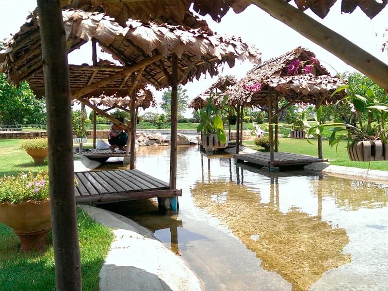 Bhumibol Dam reservoir surrounded by misty hills