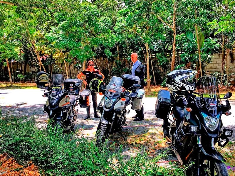 Bike crossing a jungle creek on an off-road trail